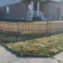 2ft7inch High pressure treated wooden picket fence around the front property line. 2ft7inch High pressure treated wooden picket fence around the front property line.