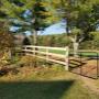 3 Board Oak Fencing with black steel mesh gate. 3 Board Oak Fencing with black steel mesh gate.