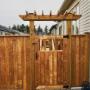 Pressure treated wooden gate with arbor. Pressure treated wooden gate with arbor.