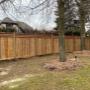 8ft High pressure treated wooden privacy fencing with vertical fence boards in Board on Board style with horizontal 2x6 board topper. 8ft High pressure treated wooden privacy fencing with vertical fence boards in Board on Board style with horizontal 2x6 board topper.