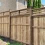8ft High pressure treated wooden privacy fencing with single layer of fence boards with horizontal board topper. 8ft High pressure treated wooden privacy fencing with single layer of fence boards with horizontal board topper.