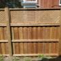 Board on Board style pressure treated wooden privacy fencing with Privacy Plus lattice topper.
3 Horizontal 2x4 cross members visible. On 6x6inch posts. Board on Board style pressure treated wooden privacy fencing with Privacy Plus lattice topper.
3 Horizontal 2x4 cross members visible. On 6x6inch posts.