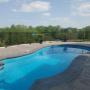 Custom fabricated ornamental iron fencing pool enclosure fencing. Set into armor stone retaining wall. Custom fabricated ornamental iron fencing pool enclosure fencing. Set into armor stone retaining wall.