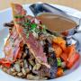Seared beef liver with bacon, stout onion gravy, mashed potatoes, and seasonal vegetables at Malt & Barley Public House in Kitchener. Seared beef liver with bacon, stout onion gravy, mashed potatoes, and seasonal vegetables at Malt & Barley Public House in Kitchener.