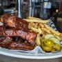 Tequila lime BBQ rib dinner with hand-cut fries, jalapeños, pickles, and East Coast slaw at Malt & Barley Public House, Kitchener. Tequila lime BBQ rib dinner with hand-cut fries, jalapeños, pickles, and East Coast slaw at Malt & Barley Public House, Kitchener.