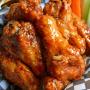 One pound of jumbo chicken wings, tossed in your choice of sauce. Perfect for sharing with friends on game night. One pound of jumbo chicken wings, tossed in your choice of sauce. Perfect for sharing with friends on game night.