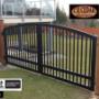 CV Cedar installed this metal vehicle gate and cedar fence panels with black metal post caps CV Cedar installed this metal vehicle gate and cedar fence panels with black metal post caps