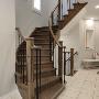 Staircase refinished with a warm chestnut colour, to add some contrast to the white tones of the house Staircase refinished with a warm chestnut colour, to add some contrast to the white tones of the house
