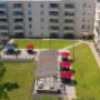 Outdoor patio with gazebo, umbrellas, and seating. Outdoor patio with gazebo, umbrellas, and seating.