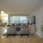 Spacious living room with hardwood flooring at The Parkwood in Belleville, ON Spacious living room with hardwood flooring at The Parkwood in Belleville, ON