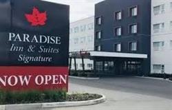 Paradise Inn and Suites Signature