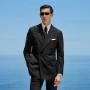 This black striped suit is cut to a tailored fit, offering a refined silhouette with structured shoulders. Paired with slim trousers featuring side-adjusters and a flat front for modern sophistication. This black striped suit is cut to a tailored fit, offering a refined silhouette with structured shoulders. Paired with slim trousers featuring side-adjusters and a flat front for modern sophistication.