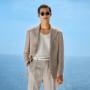 This taupe blazer is cut to a relaxed fit with natural shoulders, featuring notch lapels and patch pockets. This taupe blazer is cut to a relaxed fit with natural shoulders, featuring notch lapels and patch pockets.