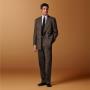 This mid brown herringbone suit is cut to a tailored fit with a padded shoulder and fitted silhouette. Paired with wide-leg straight trousers featuring a single pleat and belt loops. This mid brown herringbone suit is cut to a tailored fit with a padded shoulder and fitted silhouette. Paired with wide-leg straight trousers featuring a single pleat and belt loops.