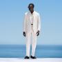 This off-white suit is cut to a relaxed fit with a roomy chest and natural shoulder, featuring a wide notch lapel. Paired with wide-leg straight trousers, offering a single pleat and belt loops. This off-white suit is cut to a relaxed fit with a roomy chest and natural shoulder, featuring a wide notch lapel. Paired with wide-leg straight trousers, offering a single pleat and belt loops.