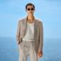 This taupe blazer is cut to a relaxed fit with natural shoulders, featuring notch lapels and patch pockets. This taupe blazer is cut to a relaxed fit with natural shoulders, featuring notch lapels and patch pockets.
