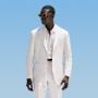 This off-white suit is cut to a relaxed fit with a roomy chest and natural shoulder, featuring a wide notch lapel. Paired with wide-leg straight trousers, offering a single pleat and belt loops. This off-white suit is cut to a relaxed fit with a roomy chest and natural shoulder, featuring a wide notch lapel. Paired with wide-leg straight trousers, offering a single pleat and belt loops.