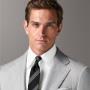 This light grey suit is cut to a tailored fit with structured shoulders for a streamlined silhouette, paired with slim-cut trousers featuring a flat-front design and side-adjusters. This light grey suit is cut to a tailored fit with structured shoulders for a streamlined silhouette, paired with slim-cut trousers featuring a flat-front design and side-adjusters.