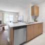 Kitchen with breakfast bar at Tennyson Apartments in Edmonton, AB Kitchen with breakfast bar at Tennyson Apartments in Edmonton, AB