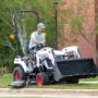 The Bobcat CT1025 with bucket and mid-mount mower The Bobcat CT1025 with bucket and mid-mount mower