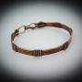 Bracelet in patinated copper wires Bracelet in patinated copper wires