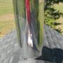 Improper non code compliant flashing around insulated chimney pipe. Improper non code compliant flashing around insulated chimney pipe.