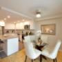 Open-concept kitchen with dining area at Silvercreek Towers in Georgetown, ON Open-concept kitchen with dining area at Silvercreek Towers in Georgetown, ON