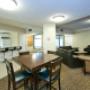 Social room with kitchen at Springbank Apartments in London, ON Social room with kitchen at Springbank Apartments in London, ON