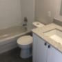 Bathroom with tub shower at San Remo/Monaco Towers in Toronto, ON Bathroom with tub shower at San Remo/Monaco Towers in Toronto, ON