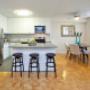 Modern kitchen with stainless steel appliances and breakfast bar at Northumberland Place in Port Hope, ON Modern kitchen with stainless steel appliances and breakfast bar at Northumberland Place in Port Hope, ON