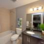 Bathroom with tub shower at Juliana Place in Woodstock, ON Bathroom with tub shower at Juliana Place in Woodstock, ON
