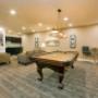Social room with billiards table at Juliana Place in Woodstock, ON Social room with billiards table at Juliana Place in Woodstock, ON