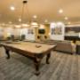 Social room with billiards table at Juliana Place in Woodstock, ON Social room with billiards table at Juliana Place in Woodstock, ON