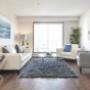 Spacious living room with luxury vinyl plank flooring at Hollick Kenyon in Edmonton, AB Spacious living room with luxury vinyl plank flooring at Hollick Kenyon in Edmonton, AB