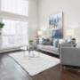 Spacious living room with luxury vinyl plank flooring at Hollick Kenyon in Edmonton, AB Spacious living room with luxury vinyl plank flooring at Hollick Kenyon in Edmonton, AB