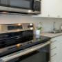 Modern kitchen with stainless steel appliances Modern kitchen with stainless steel appliances
