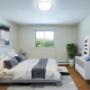 Large bedroom with luxury vinyl plank flooring at Regency Tower in Owen Sound, ON Large bedroom with luxury vinyl plank flooring at Regency Tower in Owen Sound, ON