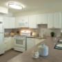 Modern kitchen with breakfast bar at Mary Street Apartments in Whitby, ON Modern kitchen with breakfast bar at Mary Street Apartments in Whitby, ON