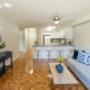 Spacious living room with hardwood flooring at Mary Street Apartments in Whitby, ON Spacious living room with hardwood flooring at Mary Street Apartments in Whitby, ON