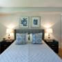 Bedroom with hardwood flooring at Mary Street Apartments in Whitby, ON Bedroom with hardwood flooring at Mary Street Apartments in Whitby, ON
