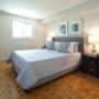 Bedroom with hardwood flooring at Mary Street Apartments in Whitby, ON Bedroom with hardwood flooring at Mary Street Apartments in Whitby, ON