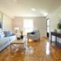 Spacious living room with hardwood flooring at Mary Street Apartments in Whitby, ON Spacious living room with hardwood flooring at Mary Street Apartments in Whitby, ON