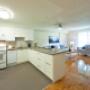 Modern kitchen with breakfast bar at Mary Street Apartments in Whitby, ON Modern kitchen with breakfast bar at Mary Street Apartments in Whitby, ON