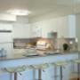 Modern kitchen with breakfast bar at Mary Street Apartments in Whitby, ON Modern kitchen with breakfast bar at Mary Street Apartments in Whitby, ON