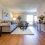 Spacious living room with balcony access at London Road Apartments in Sarnia, ON Spacious living room with balcony access at London Road Apartments in Sarnia, ON