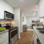 Modern kitchen with stainless steel appliances at Acton Apartments in Acton, ON Modern kitchen with stainless steel appliances at Acton Apartments in Acton, ON