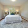 Spacious bedroom with hardwood flooring at Acton Apartments in Acton, ON Spacious bedroom with hardwood flooring at Acton Apartments in Acton, ON