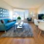 Bright, spacious living room with balcony access at Britannia by the Bay in Ottawa, ON Bright, spacious living room with balcony access at Britannia by the Bay in Ottawa, ON