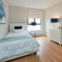 Large bedroom with luxury vinyl plank flooring at Bay Terrace Apartments in Belleville, ON Large bedroom with luxury vinyl plank flooring at Bay Terrace Apartments in Belleville, ON