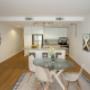 Open-concept kitchen with breakfast bar, stainless steel appliances, and dining area at 80 Beverly Street in Toronto, ON Open-concept kitchen with breakfast bar, stainless steel appliances, and dining area at 80 Beverly Street in Toronto, ON